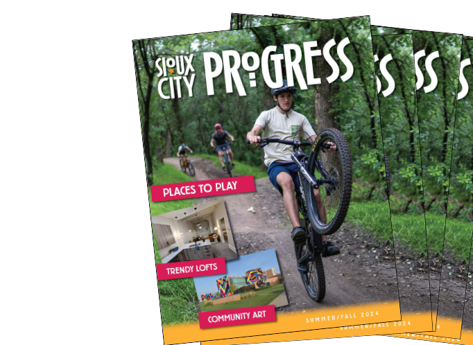 newsletter cover with bicyclist